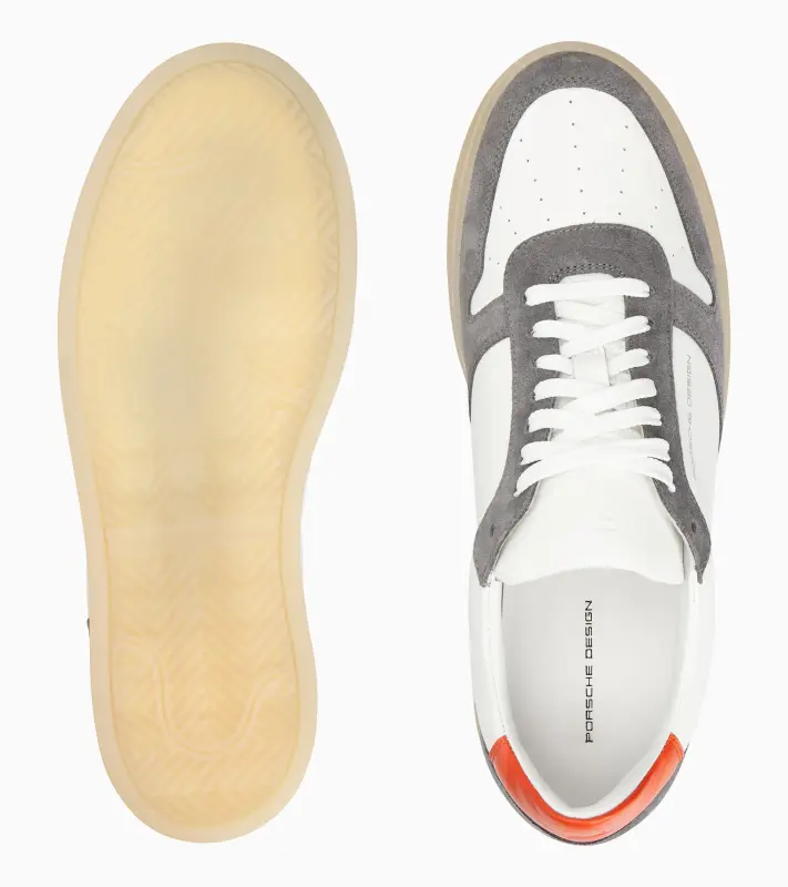 PORSCHE DESIGN Gumsole Sneaker Obuv teniska kožená volnočasová bílá s šedými doplňky a výraznou oranžovou patkou
