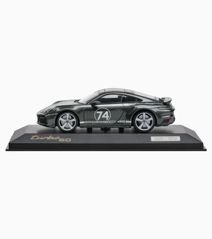 PORSCHE 911 Turbo S with Heritage Design Package (992) Limited Edition Model 1:43 startovní číslo 74 tmavě zelená metalíza