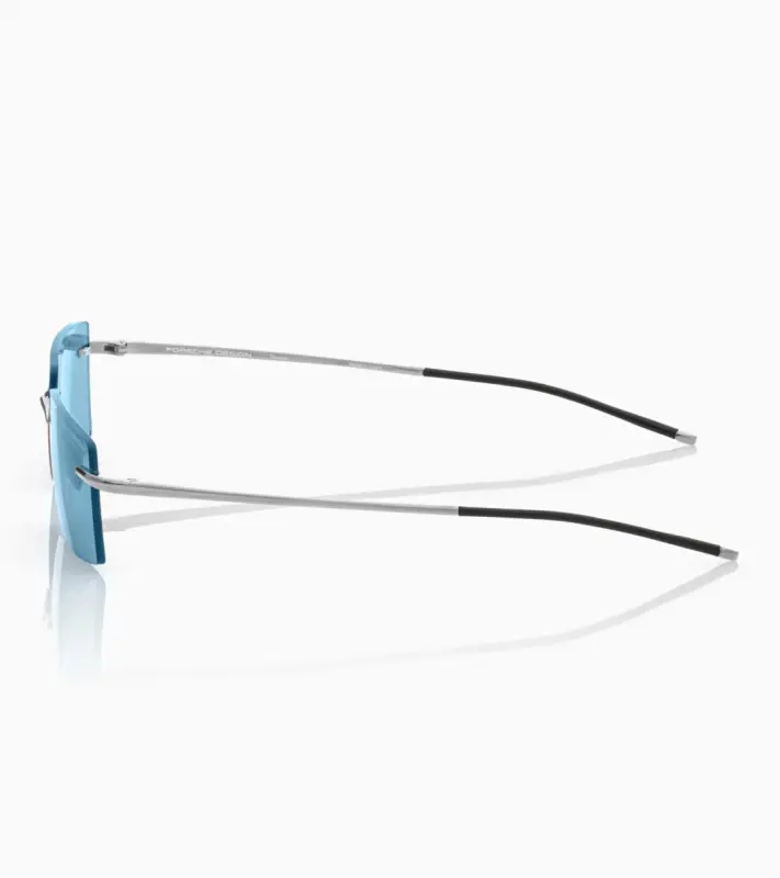 PORSCHE DESIGN P´86018 Sunglasses Liquid Titanium #8 Sluneční brýle bezrámečkové uni v barvě palladium se světle modrými skly
