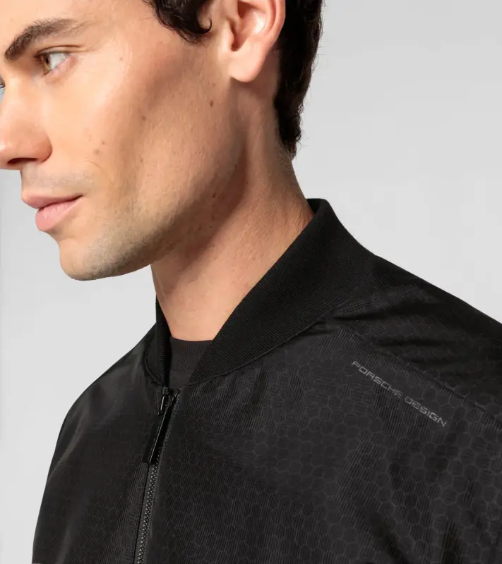 PORSCHE DESIGN Masterpiece blouson Bunda volnočasová sportovní na zip s šestiúhelníkovým vzorem černá