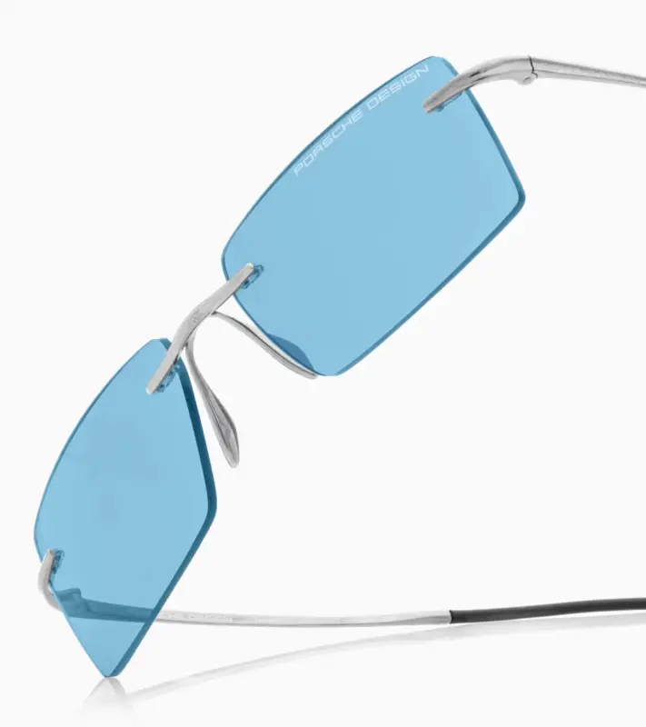 PORSCHE DESIGN P´86018 Sunglasses Liquid Titanium #8 Sluneční brýle bezrámečkové uni v barvě palladium se světle modrými skly