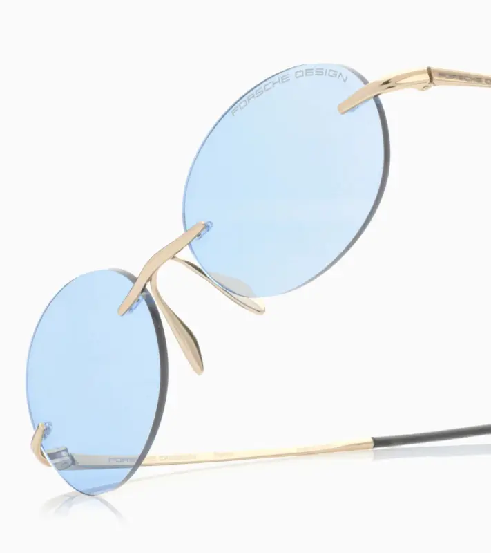 PORSCHE DESIGN P´86017 Sunglasses Liquid Titanium #7 Sluneční brýle bezrámečkové uni v barvě zlaté se světle modrými skly