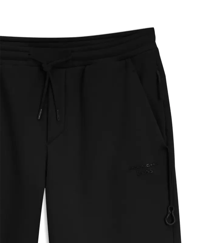 PORSCHE DESIGN Stretch-Jersey Tracksuit Bottoms with logo Porsche x BOSS Kalhoty volnočasové sportovní mírně strečové s náplety v černé