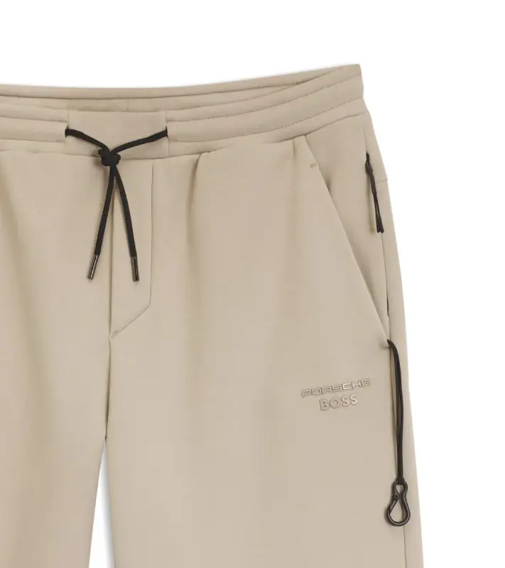 PORSCHE DESIGN Stretch-Jersey Tracksuit Bottoms with logo Porsche x BOSS Kalhoty volnočasové sportovní mírně strečové s náplety v béžové