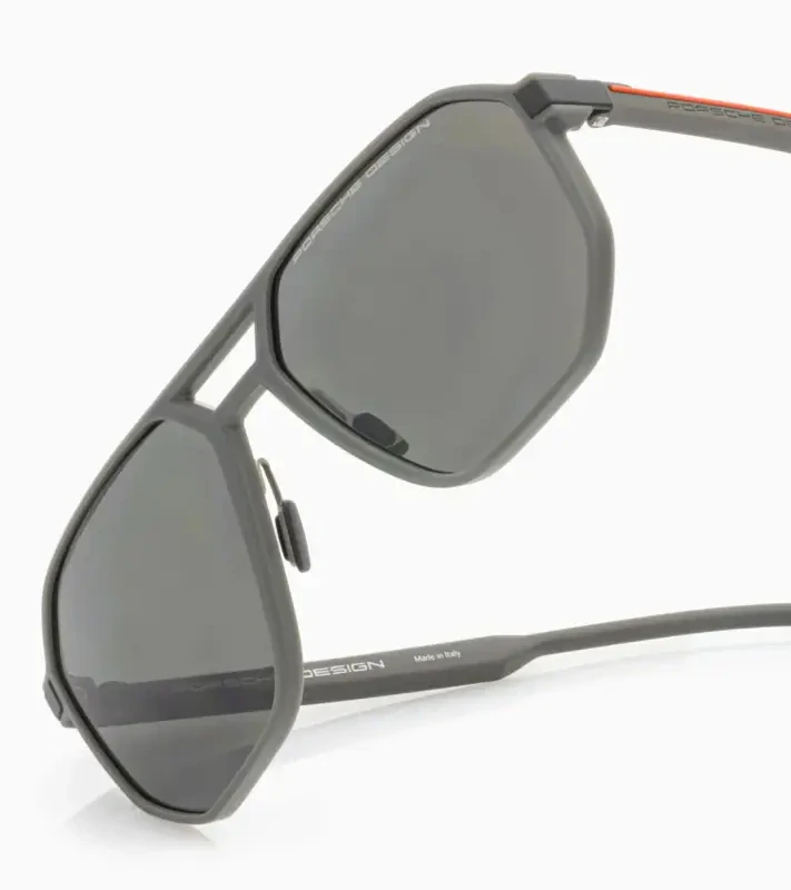 PORSCHE DESIGN P´86012 Sunglasses Neo Blade #2 Sluneční brýle charakteristických tvarů a barev. Šedooranžové s tmavě šedými polarizovanými skly.