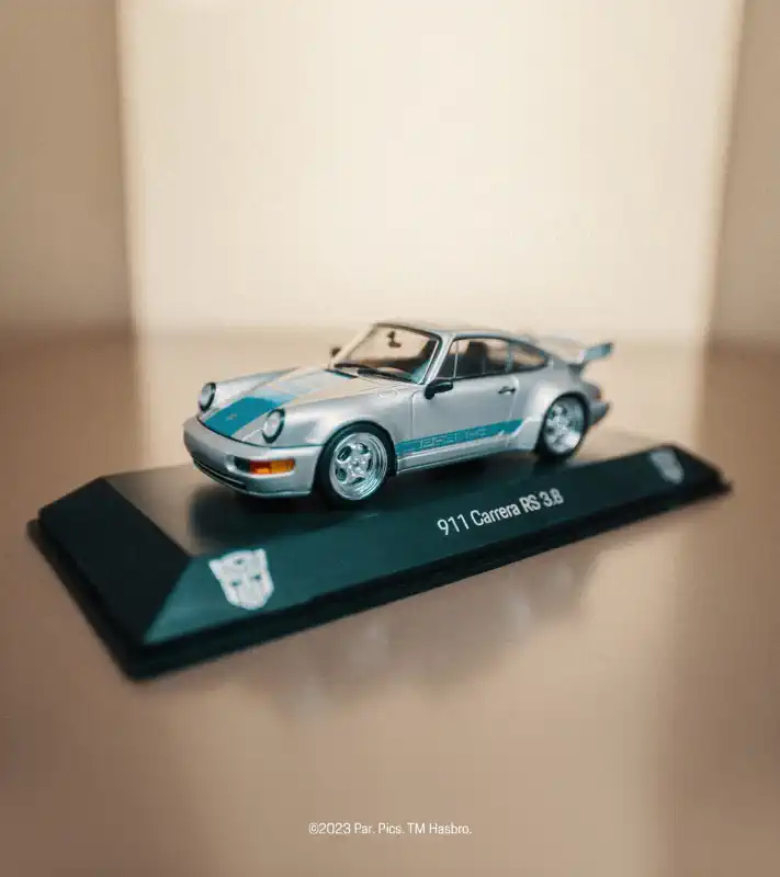 PORSCHE 911 Carrera RS 3.8 Mirage Model 1:43 stříbrná