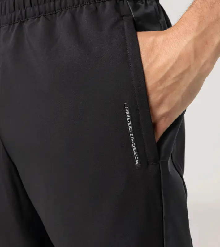 PORSCHE DESIGN Woven Tech Trousers Kalhoty tkané volnočasové sportovní černá