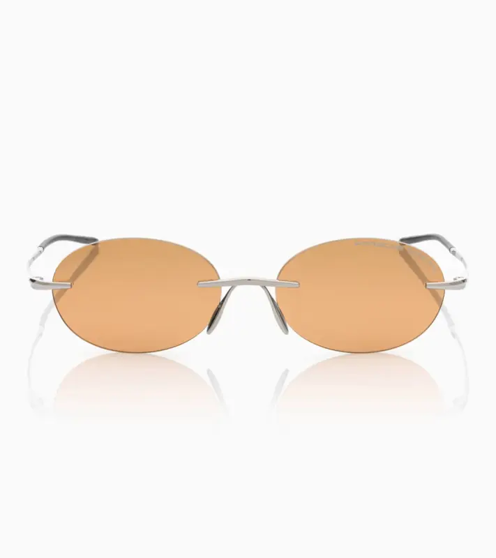 PORSCHE DESIGN P´86017 Sunglasses Liquid Titanium #7 Sluneční brýle bezrámečkové uni v barvě palladium se světle oranžovými skly