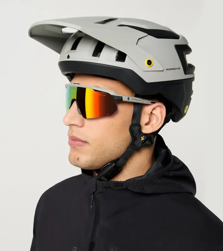 PORSCHE Bushwhacker 2Vi® Mips Mountain Bike Helma cyklistická přilba splňující nejnáročnější normy pro ochranu hlavy světle šedá