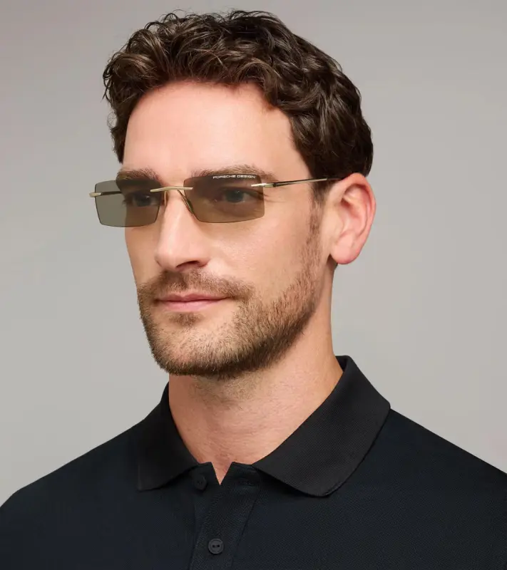 PORSCHE DESIGN P´86018 Sunglasses Liquid Titanium #8 Sluneční brýle bezrámečkové uni šedé se světle oranžovými skly