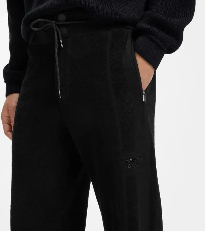 PORSCHE DESIGN Tracksuit Bottoms with contrast details Porsche x BOSS Kalhoty volnočasové sportovní s reliéfním logem a výraznými detaily v černé
