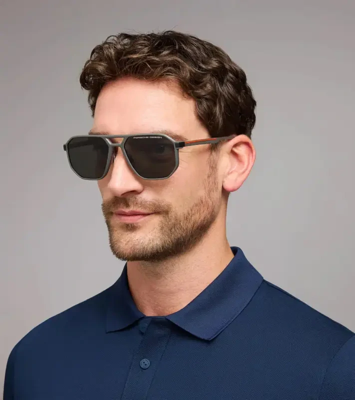 PORSCHE DESIGN P´86012 Sunglasses Neo Blade #2 Sluneční brýle charakteristických tvarů a barev. Šedooranžové s tmavě šedými polarizovanými skly.