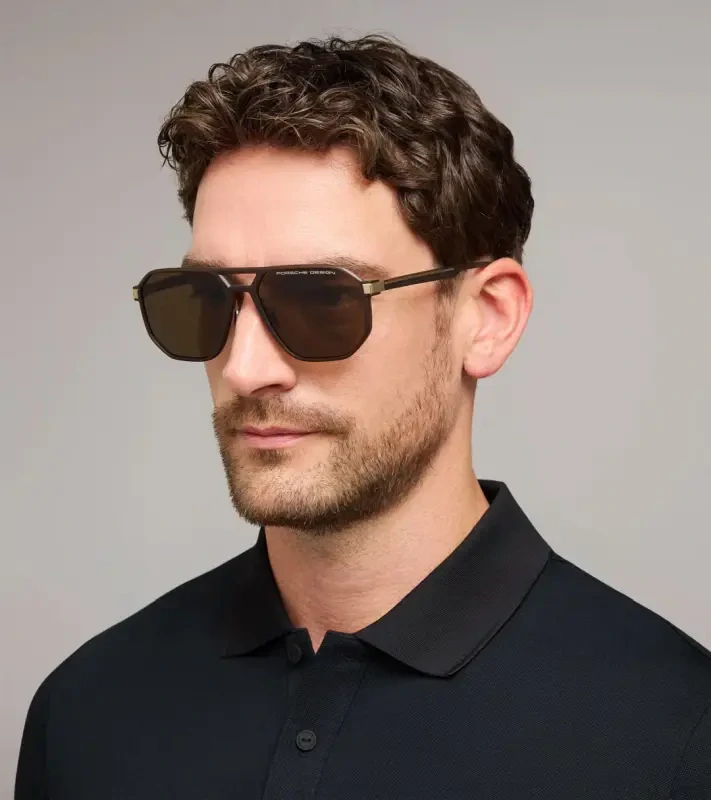 PORSCHE DESIGN P´86012 Sunglasses Neo Blade #2 Sluneční brýle typických tvarů a barev. Hnědozlatá varianta s kouřovými hnědými skly.