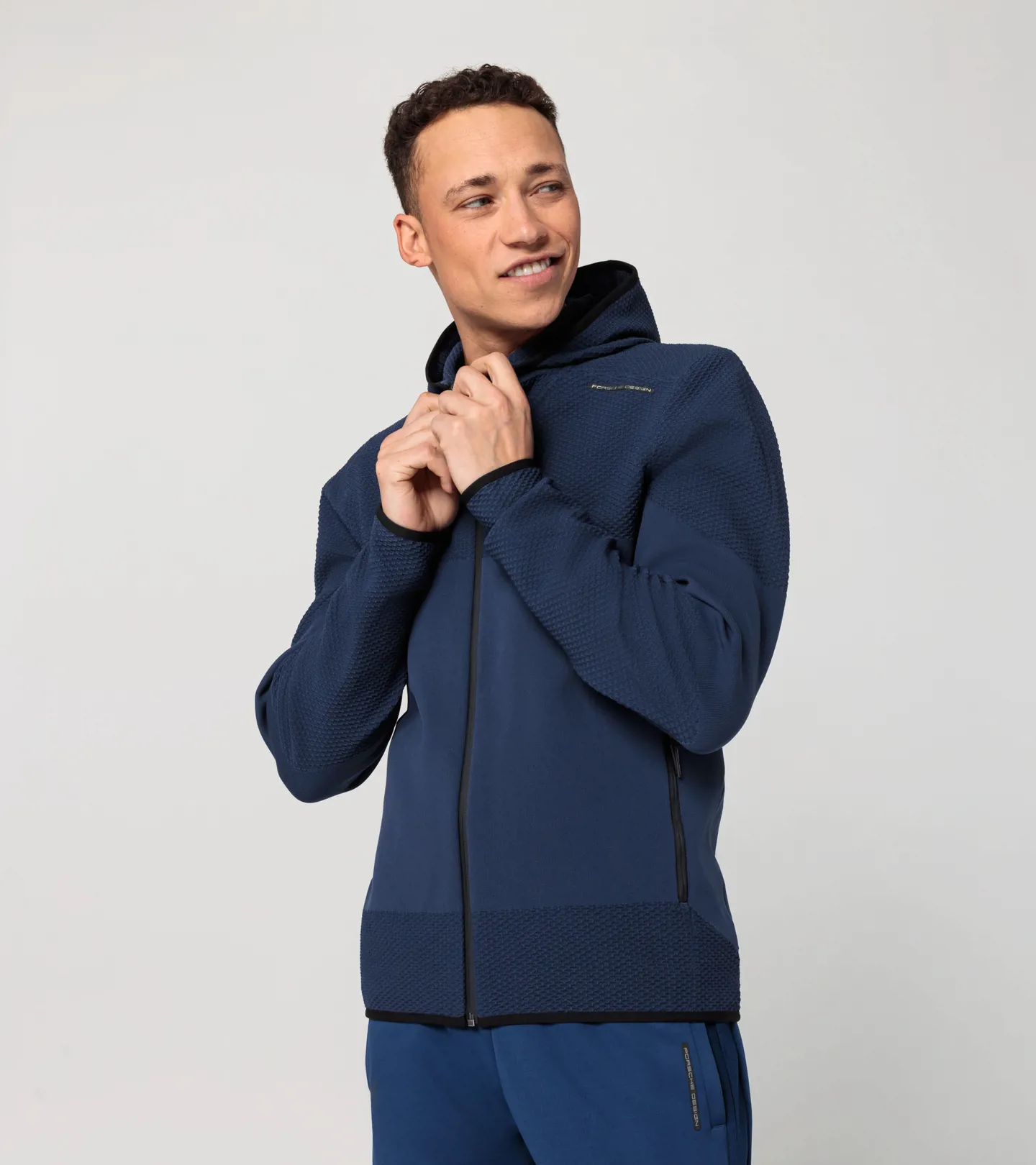 PORSCHE DESIGN EvoKNIT® Midlayer Jacket Mikina volnočasová lehká funkční tmavá perská modrá