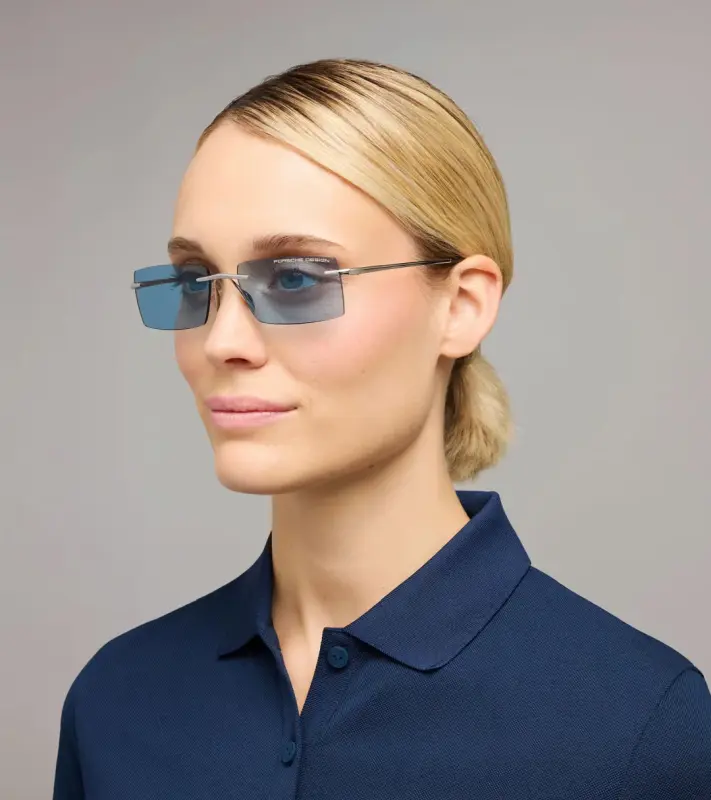 PORSCHE DESIGN P´86018 Sunglasses Liquid Titanium #8 Sluneční brýle bezrámečkové uni v barvě palladium se světle modrými skly