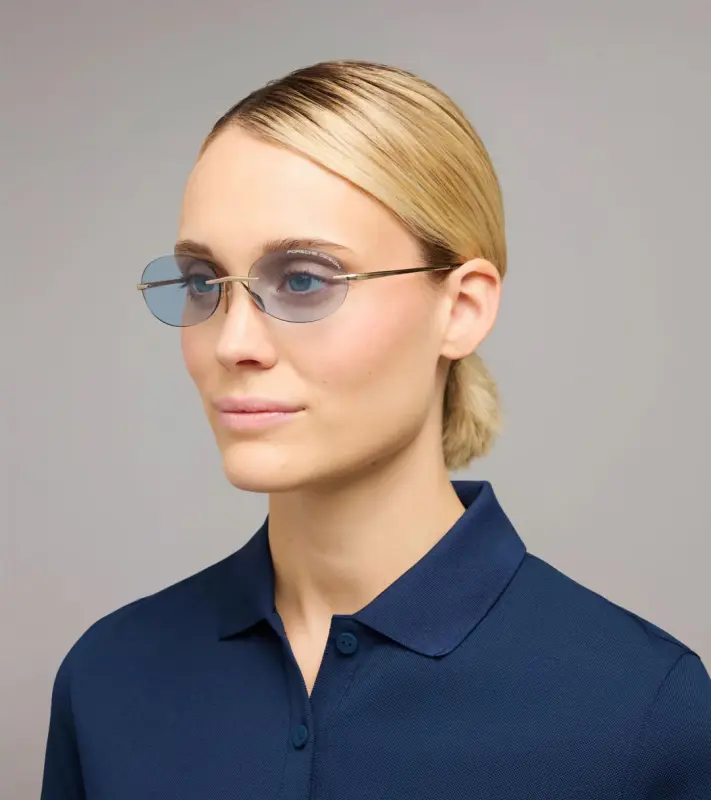 PORSCHE DESIGN P´86017 Sunglasses Liquid Titanium #7 Sluneční brýle bezrámečkové uni v barvě zlaté se světle modrými skly