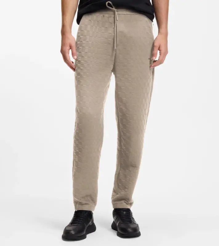 PORSCHE DESIGN Tracksuit Bottoms with Pascha Pattern Porsche x BOSS Kalhoty volnočasové sportovní se žakárovým vzorem šachovnice v béžové