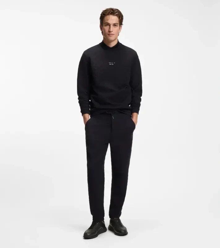 PORSCHE DESIGN Leather Sneaker with perforated details Porsche x BOSS Obuv volnočasová neformální kožená s logem černá
